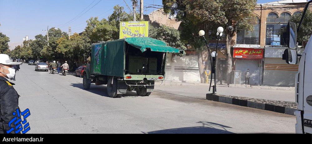 ضدعفونی خیابان های شهر نهاوند توسط تیپ انصارالحسین(ع) سپاه استان همدان+ عکس و فیلم